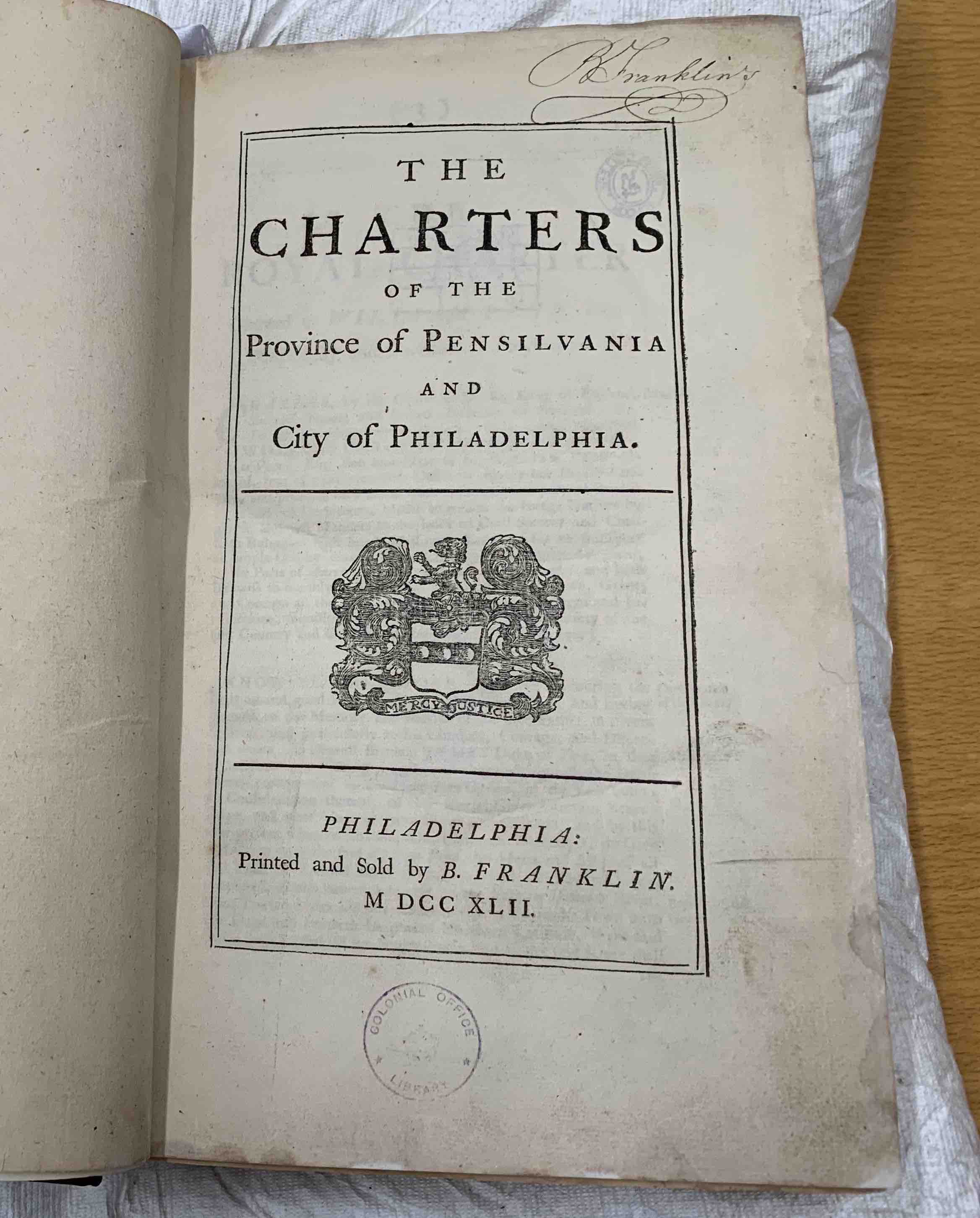 Title page of The Charters of the Province of Pensilvania and City of Philadelphia. Signed in upper right corner by B. Franklin.