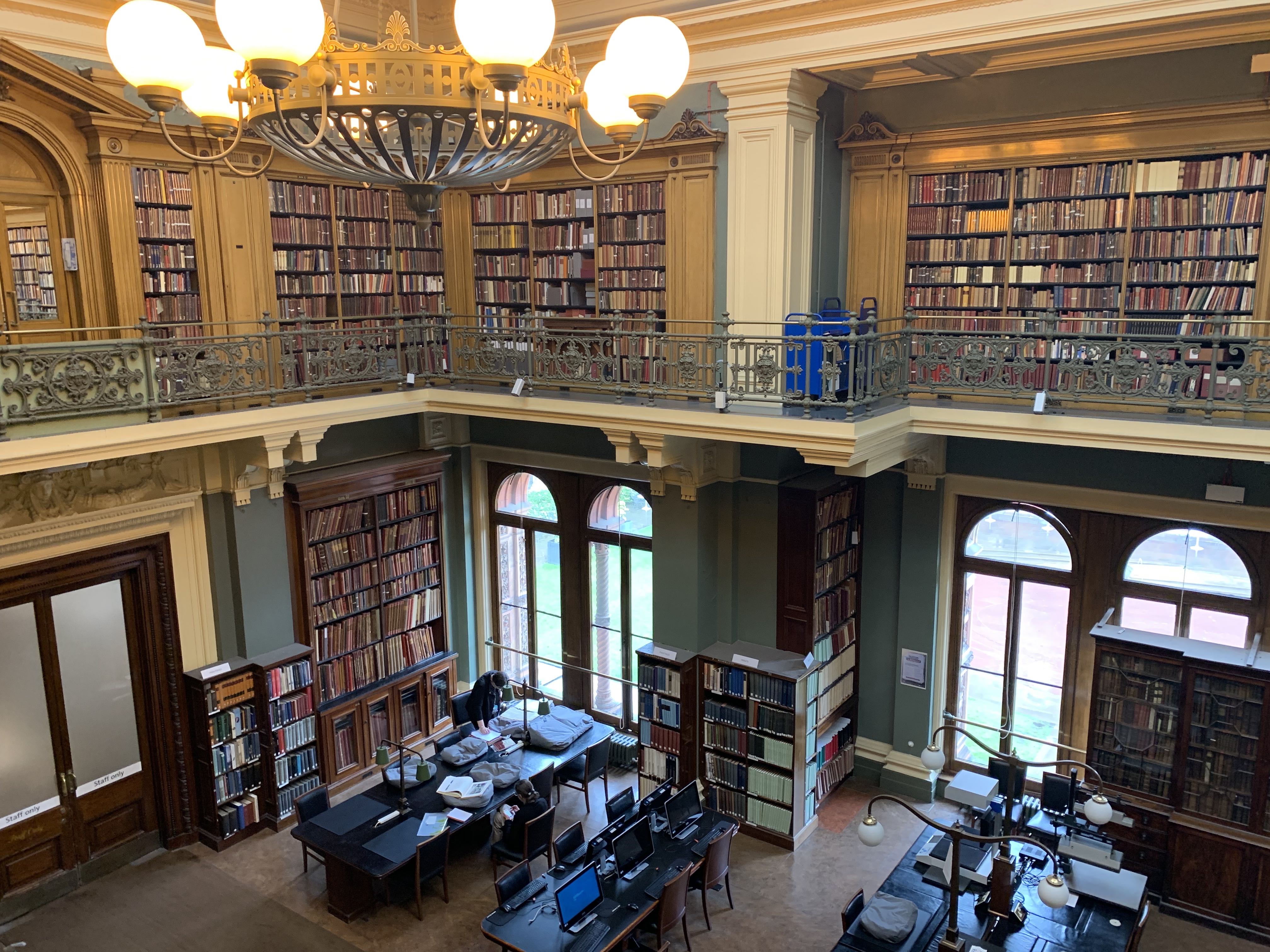 Interior of the two-level reading room of the National Art Library at the Victoria and Albert Museum