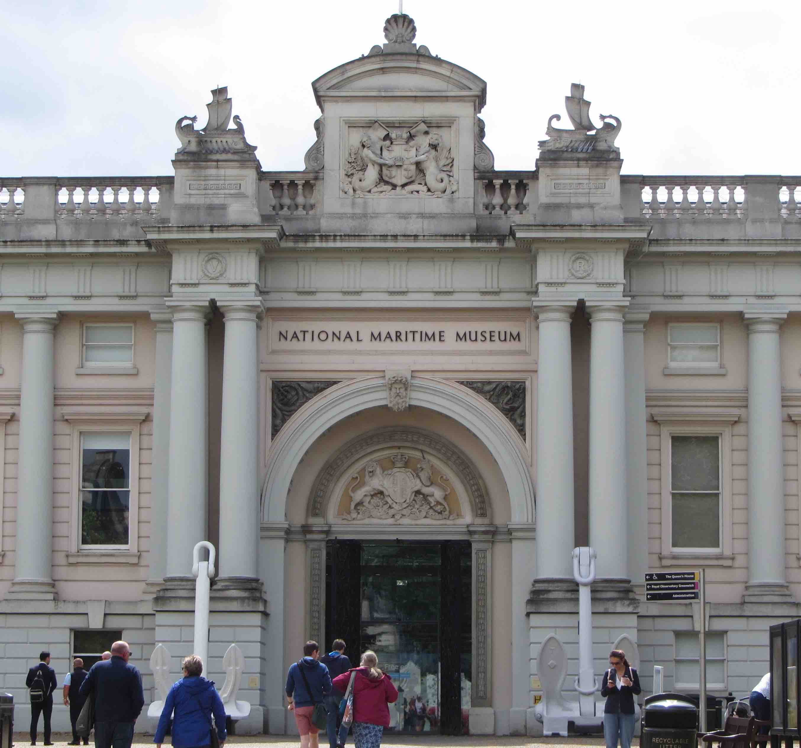 Cropped image of the front entrance to the National Maritime Museum flanked with ship anchors